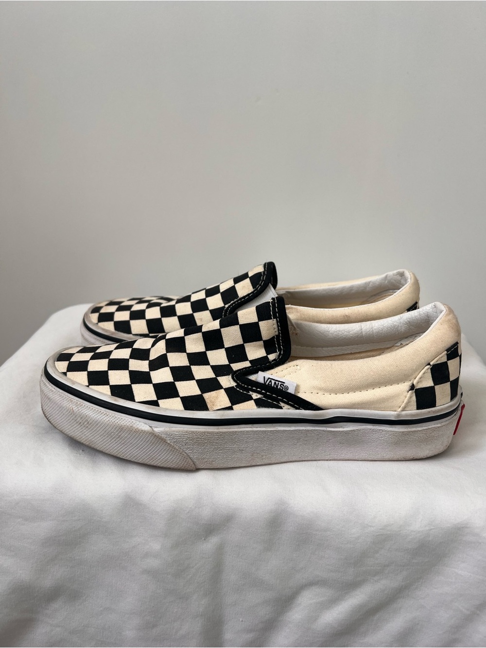 Vans Kids Slip-On Checkerboard Sneakers in Black and Cream